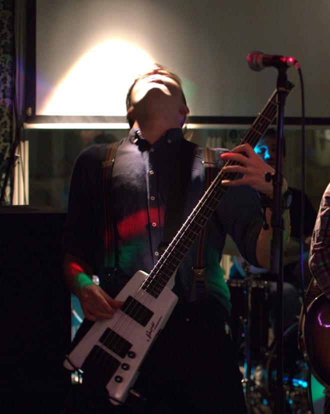 Fredrik, the bass freak, headbanging at a show